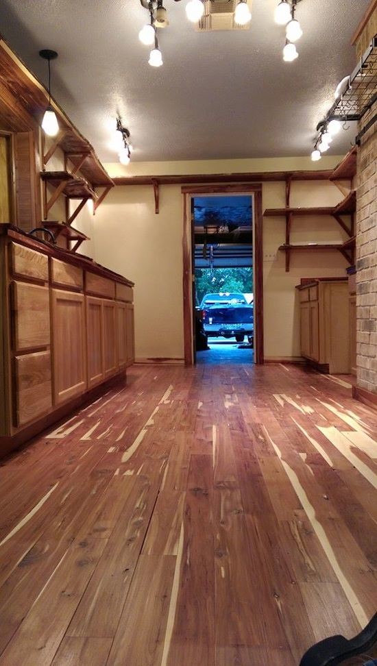 Eat-in kitchen - mid-sized galley medium tone wood floor eat-in kitchen idea in Austin with a drop-in sink and no island