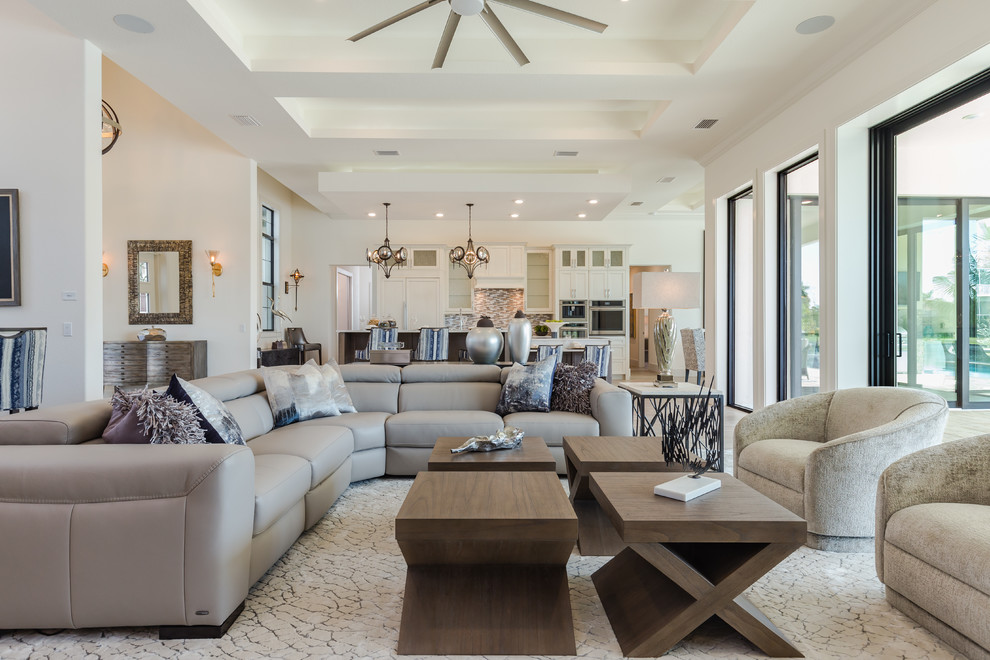 This is an example of a transitional family room in Tampa.