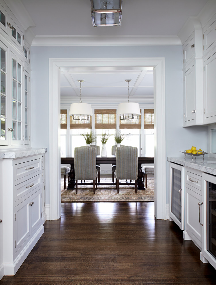 Design ideas for a mid-sized traditional kitchen/dining combo in New York with dark hardwood floors.
