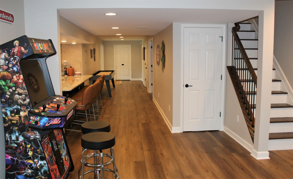 Inspiration for a large transitional walk-out basement remodel in DC Metro with a home theater
