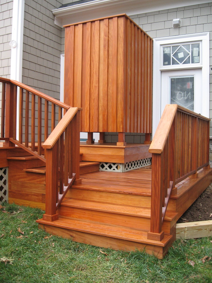 This is an example of a large contemporary backyard deck in Baltimore with an outdoor shower and no cover.