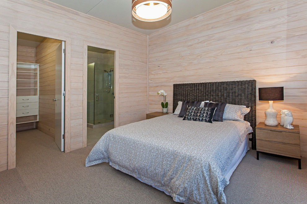 Inspiration for a mid-sized contemporary master bedroom in Christchurch with white walls, carpet and beige floor.