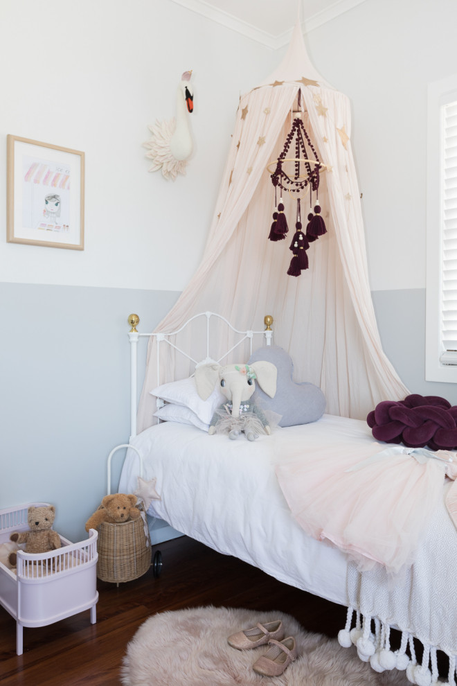 This is an example of a scandinavian gender-neutral kids' room in Sunshine Coast.