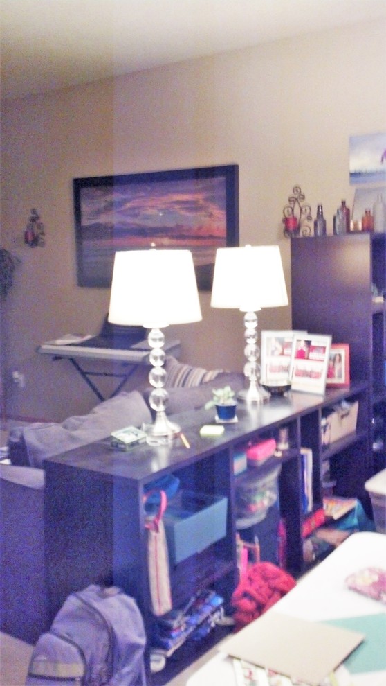Example of a mid-sized transitional open concept carpeted living room design with beige walls