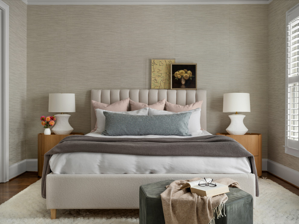 Example of a large transitional master medium tone wood floor and wallpaper bedroom design in Atlanta with beige walls and no fireplace