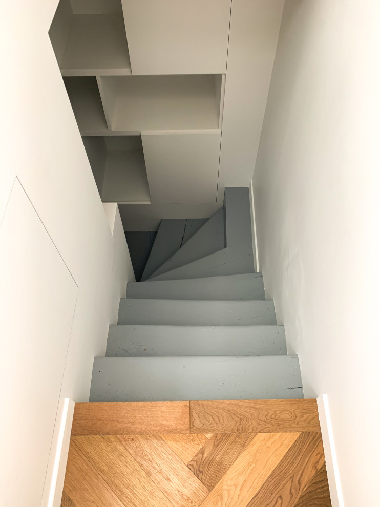 Inspiration pour un petit escalier droit design avec palier.