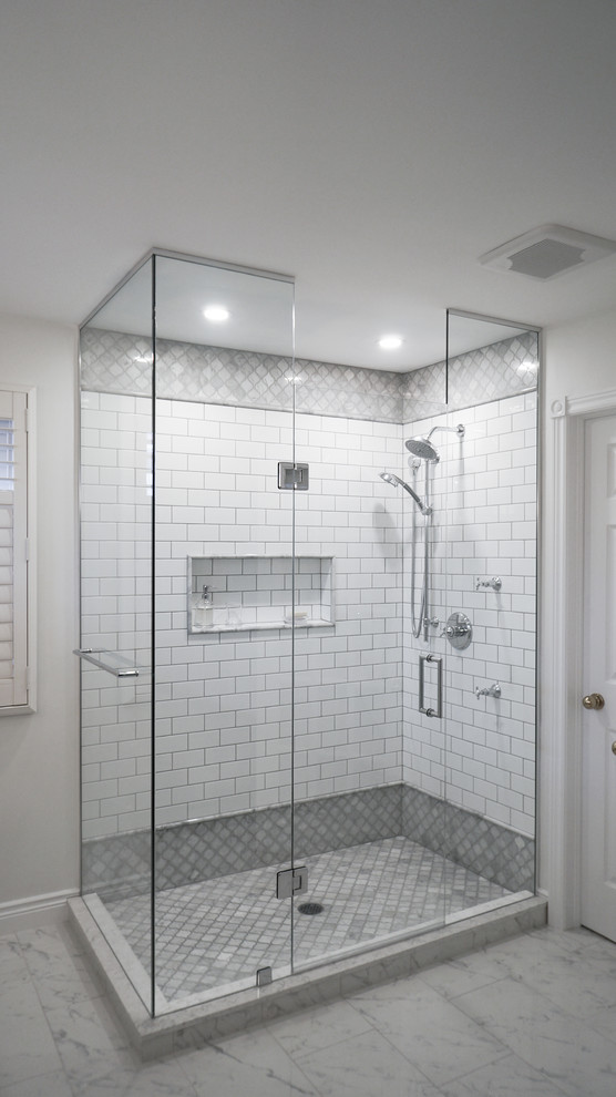 Design ideas for a mid-sized transitional master bathroom in Toronto with shaker cabinets, white cabinets, a two-piece toilet, white tile, grey walls, porcelain floors, an undermount sink and engineered quartz benchtops.