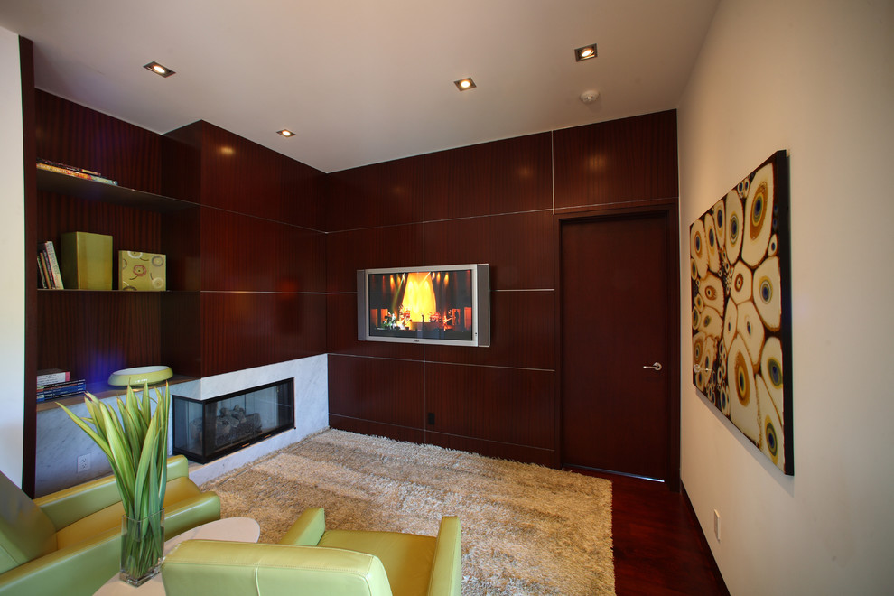 Mid-sized contemporary enclosed family room in San Francisco with brown walls, dark hardwood floors, a corner fireplace, a tile fireplace surround and a wall-mounted tv.