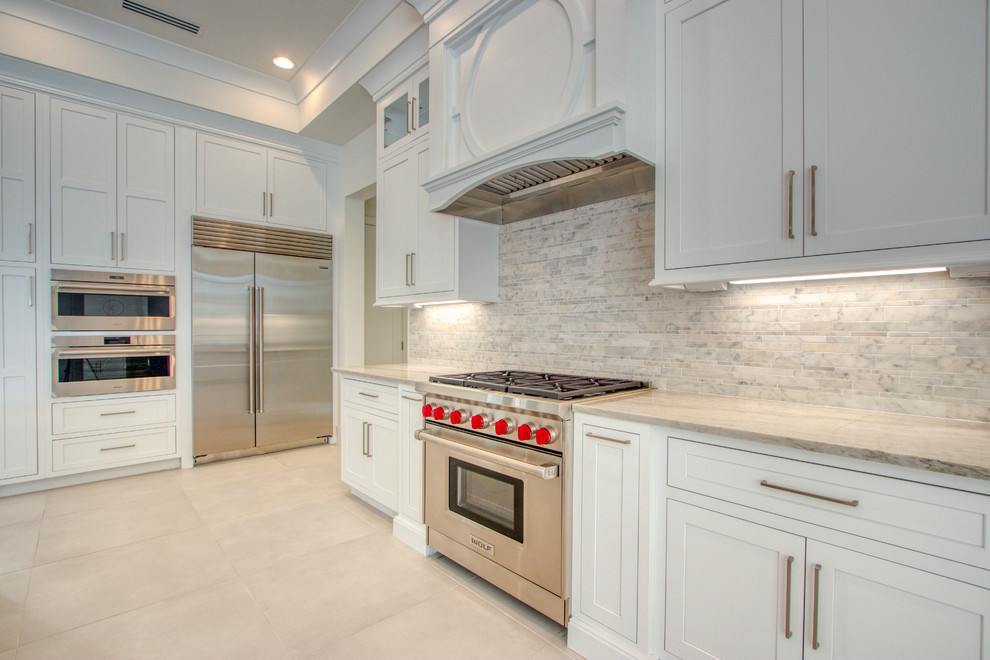 Example of a transitional kitchen design in Miami