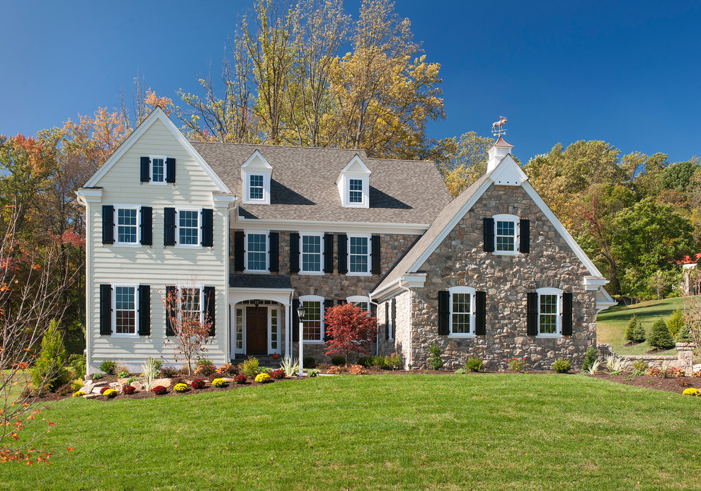 This is an example of a traditional exterior in Philadelphia with stone veneer.