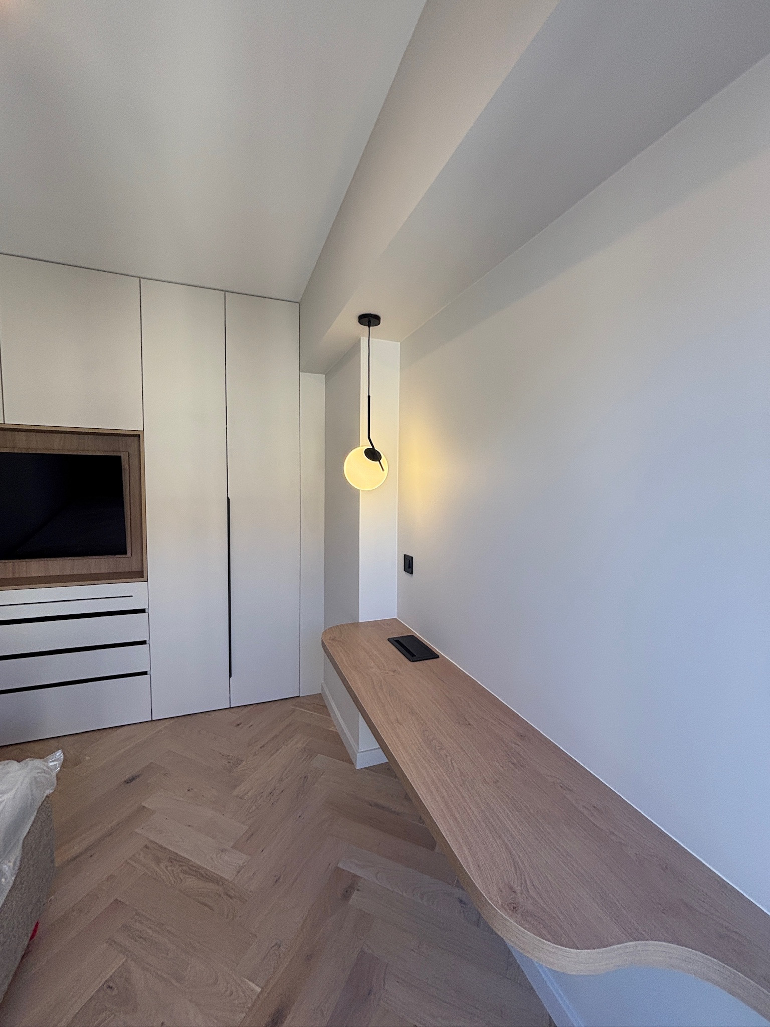 L’union parfaite : deux appartements transformés en un duplex unique