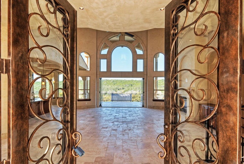 Inspiration for a rustic entryway remodel in Austin