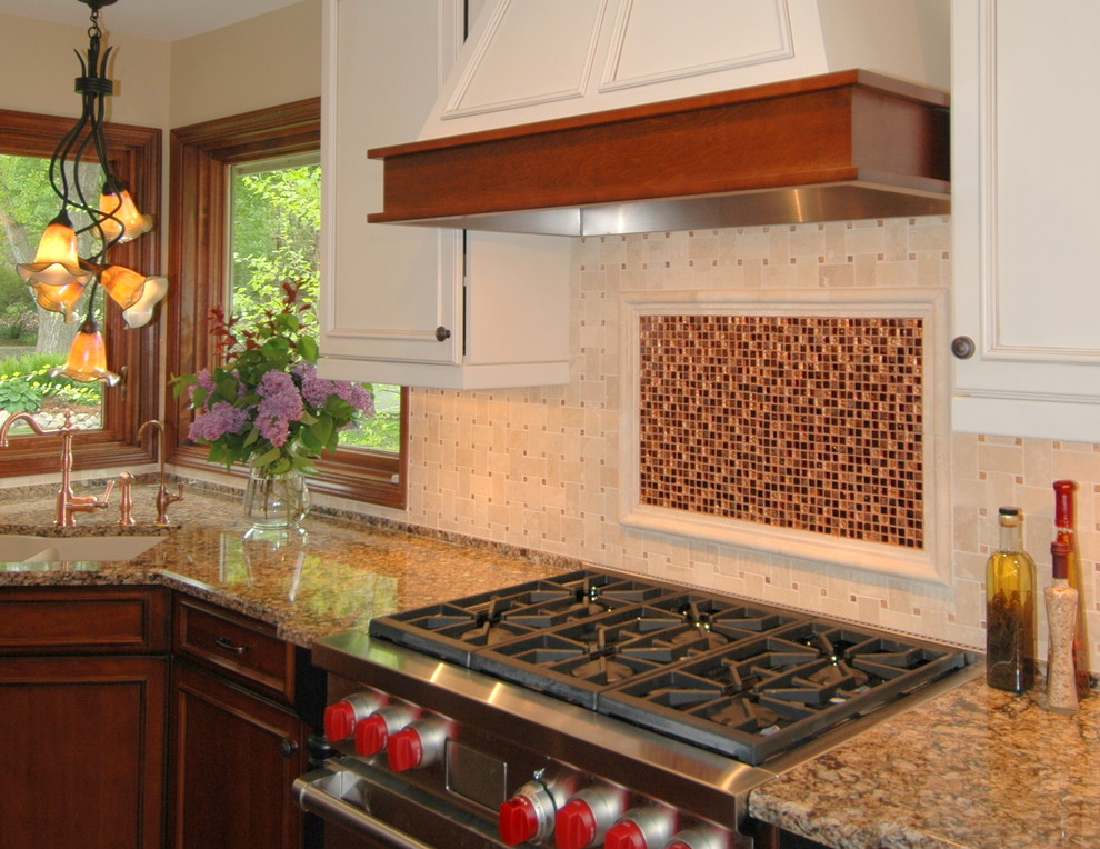 Inspiration for a large transitional kitchen remodel in Minneapolis with a double-bowl sink, raised-panel cabinets, white cabinets, quartz countertops, beige backsplash, mosaic tile backsplash and stainless steel appliances