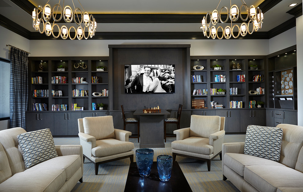 Design ideas for a large transitional enclosed family room in Miami with a library, carpet, a wall-mounted tv and grey walls.