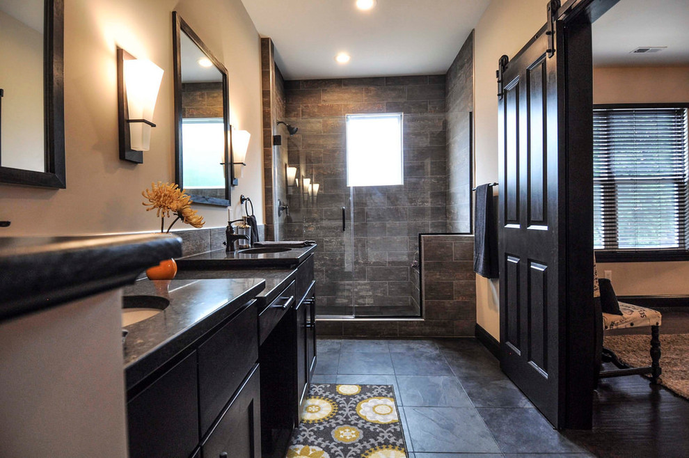 Design ideas for a large master bathroom in St Louis with shaker cabinets, dark wood cabinets, an alcove shower, multi-coloured tile, ceramic tile, grey walls, slate floors, an integrated sink and granite benchtops.