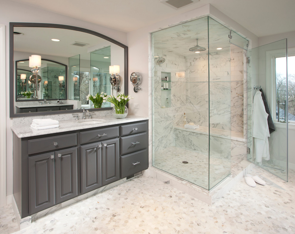 Mid-sized transitional master bathroom in Chicago with raised-panel cabinets, grey cabinets, white tile, porcelain tile, engineered quartz benchtops, a corner shower, white walls and an undermount sink.