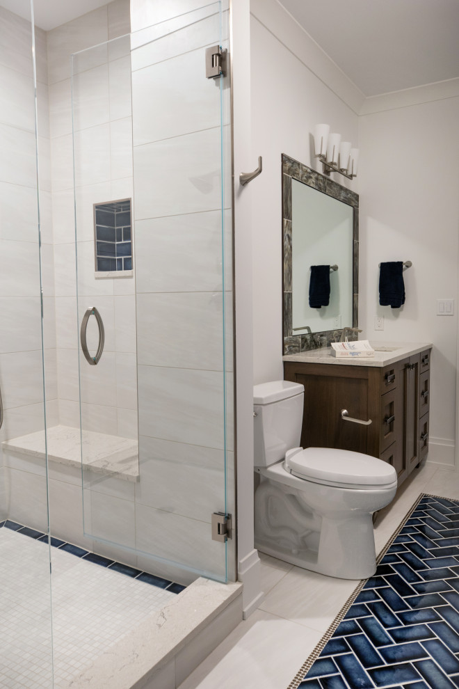 Alcove shower - mid-sized modern 3/4 white tile porcelain tile, beige floor and single-sink alcove shower idea in Milwaukee with flat-panel cabinets, dark wood cabinets, white walls, an undermount sink, quartzite countertops, a hinged shower door, white countertops and a built-in vanity
