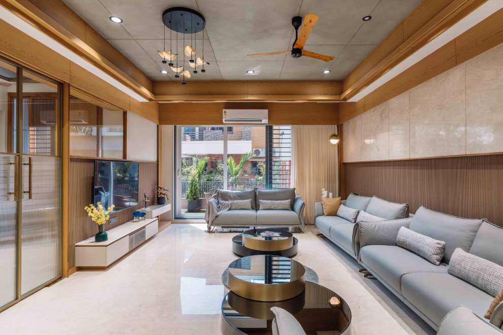 Photo of a contemporary living room in Ahmedabad.