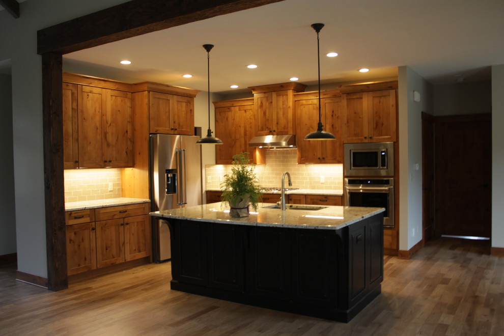 Example of a mountain style kitchen design in Grand Rapids