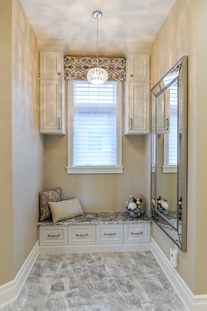 Example of a transitional home design design in Edmonton