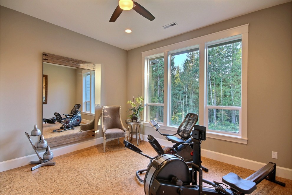 Design ideas for a mid-sized transitional home weight room in Portland with grey walls and cork floors.