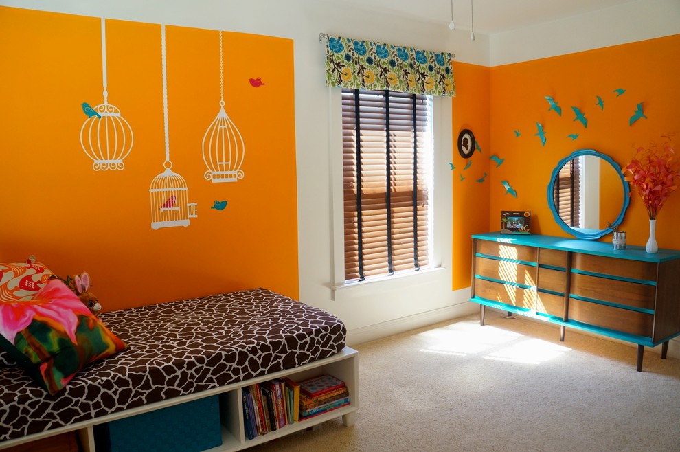 Design ideas for a modern kids' bedroom for kids 4-10 years old in Charleston with orange walls and carpet.