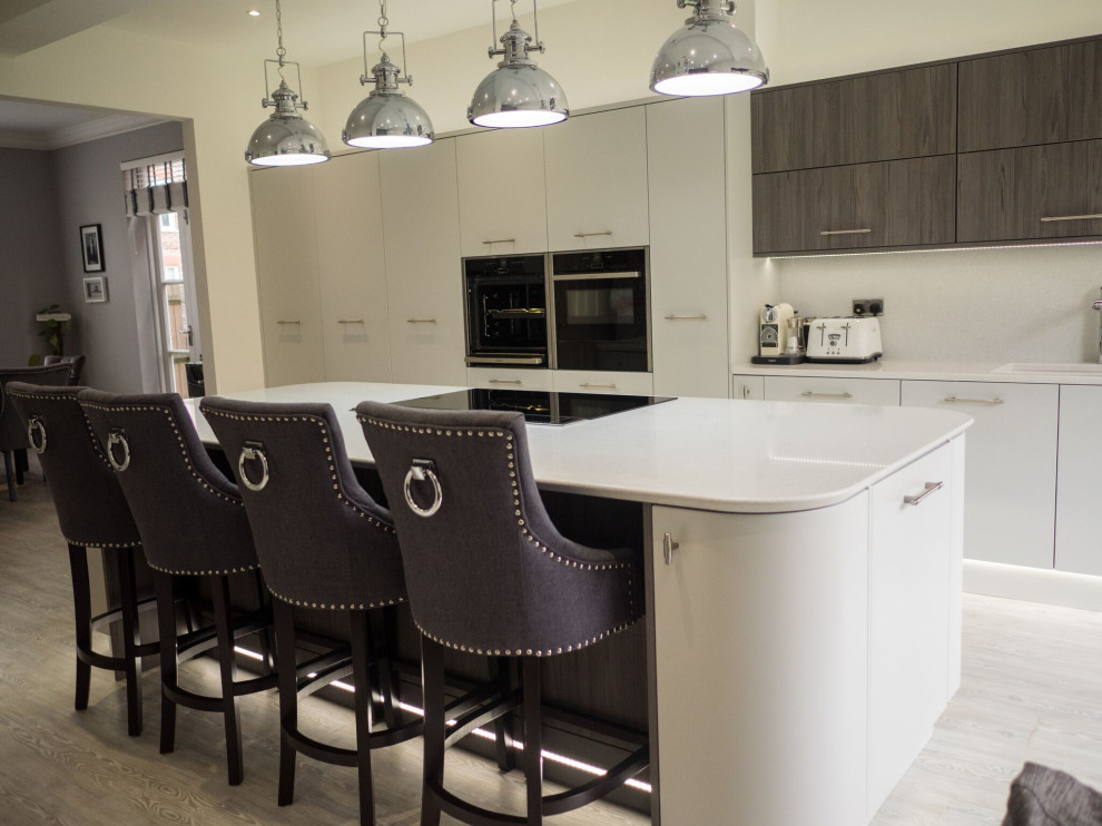Design ideas for a modern kitchen in Hertfordshire with an island.