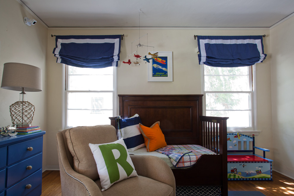 Design ideas for a mid-sized traditional gender-neutral kids' room in Other with medium hardwood floors.