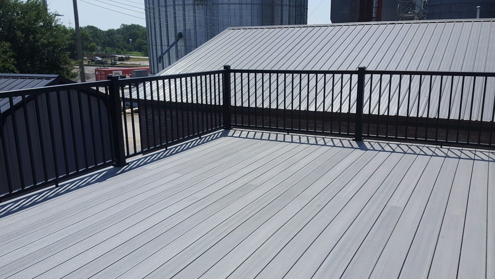 Side yard deck photo in Omaha with no cover