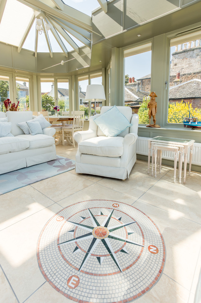 This is an example of a mid-sized beach style sunroom in Other with ceramic floors, a wood stove, a glass ceiling and multi-coloured floor.