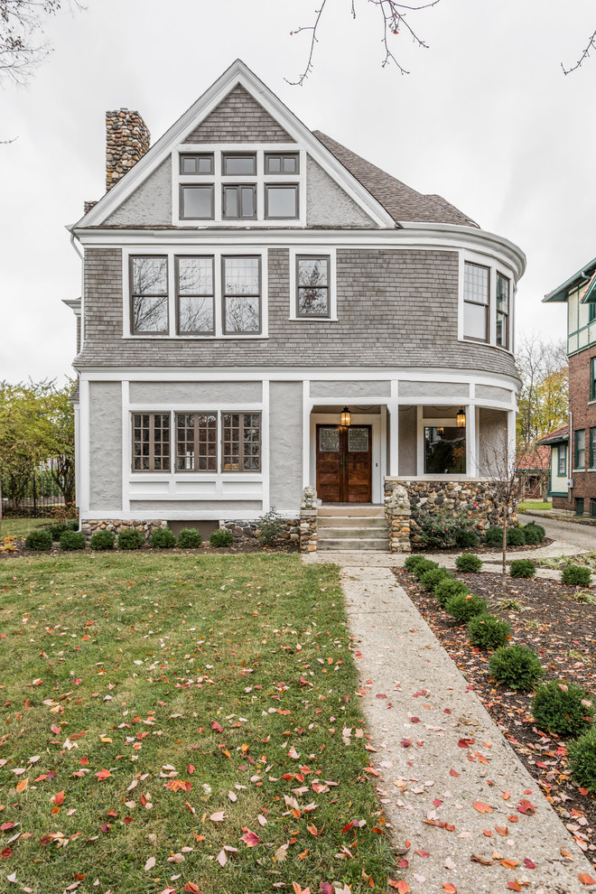 Inspiration for a traditional two-storey grey house exterior in Indianapolis.