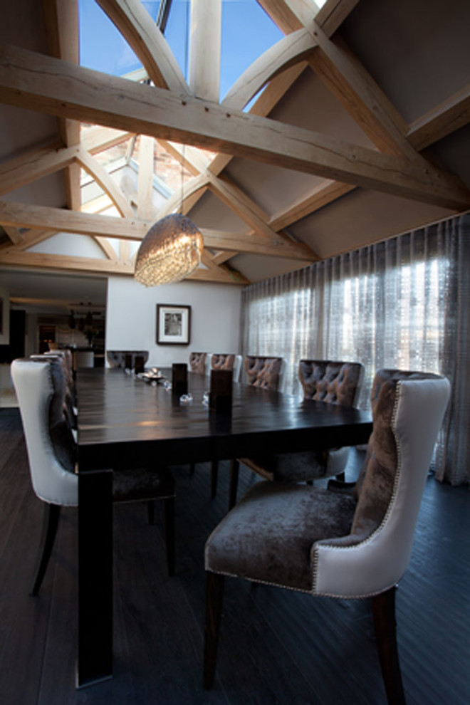 Country dining room with dark hardwood floors.