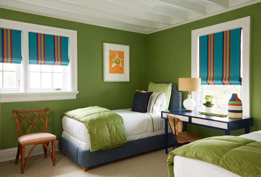 This is an example of a mid-sized beach style gender-neutral kids' room in New York with green walls and carpet.