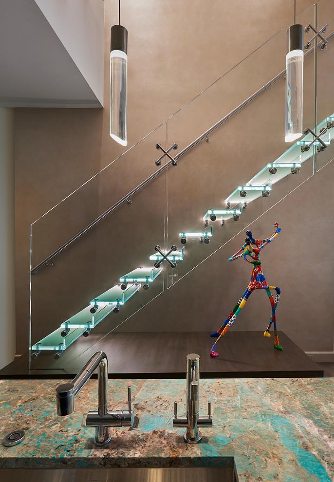 Design ideas for a mid-sized contemporary acrylic straight staircase in DC Metro with open risers.