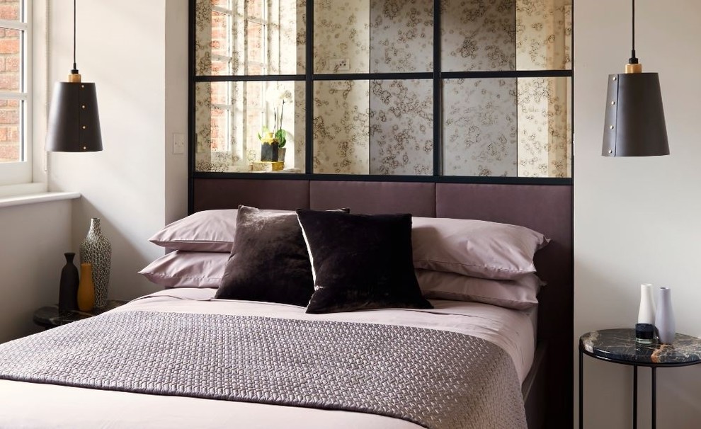Inspiration for a contemporary bedroom in Surrey.