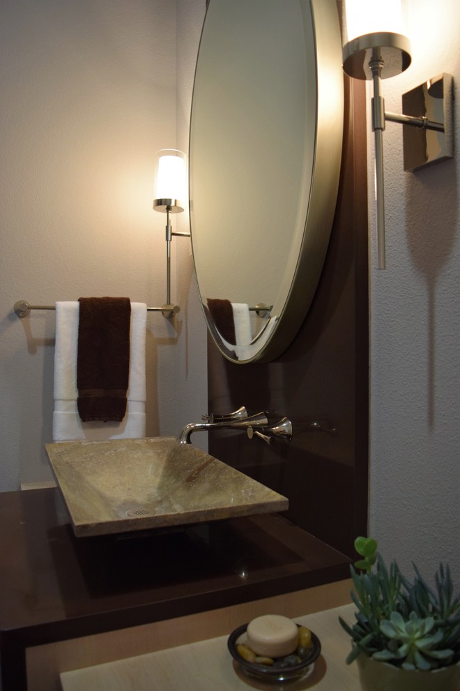 Design ideas for a small transitional powder room in Sacramento with a one-piece toilet, beige tile, beige walls, a vessel sink and wood benchtops.