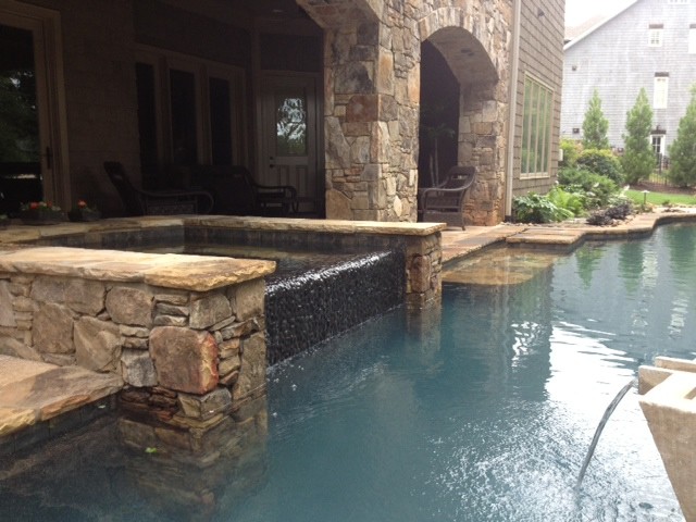 Inspiration for a rustic home design remodel in Charlotte