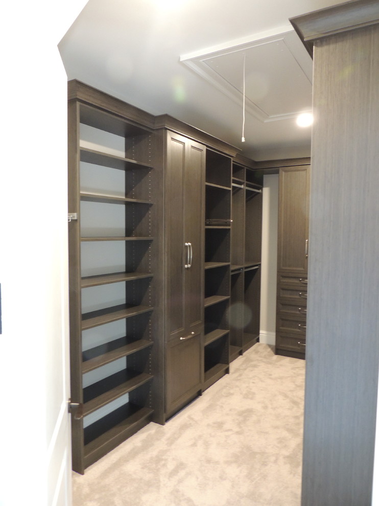 Inspiration for a large transitional gender-neutral walk-in wardrobe in Philadelphia with shaker cabinets and distressed cabinets.