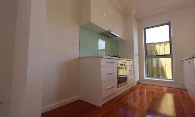 Design ideas for a modern storage and wardrobe in Melbourne.