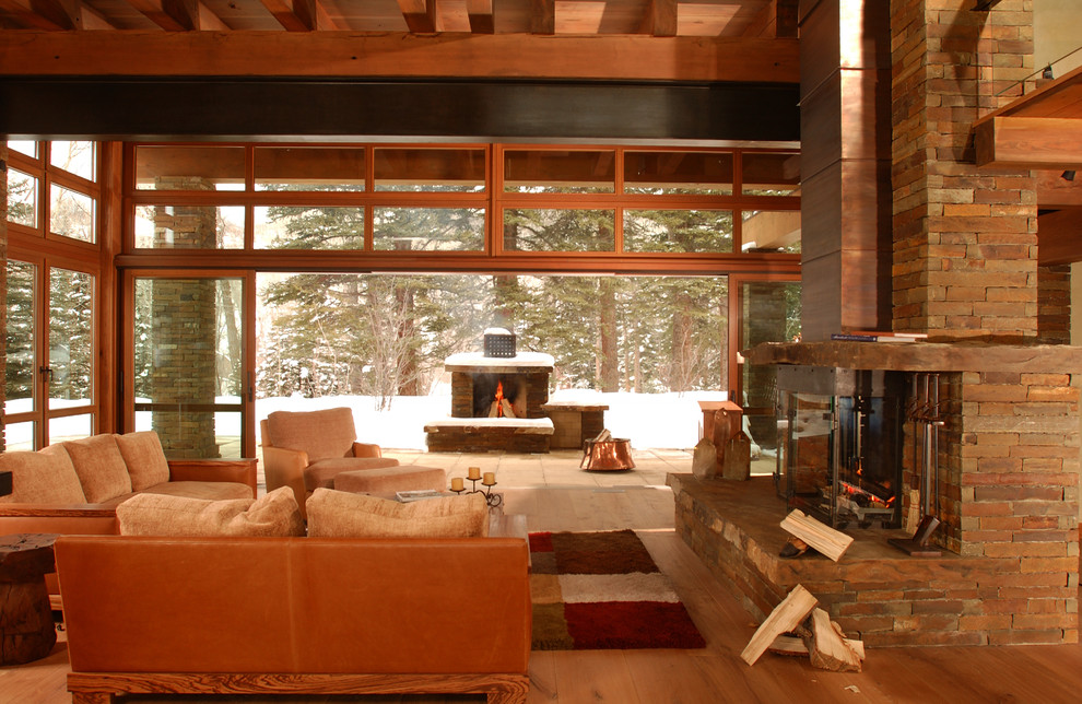 Photo of a country open concept living room in Denver.