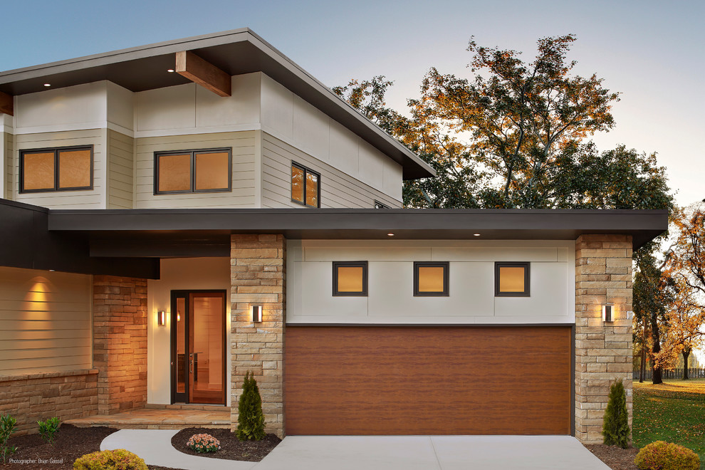 Mid-sized contemporary attached two-car garage in Austin.