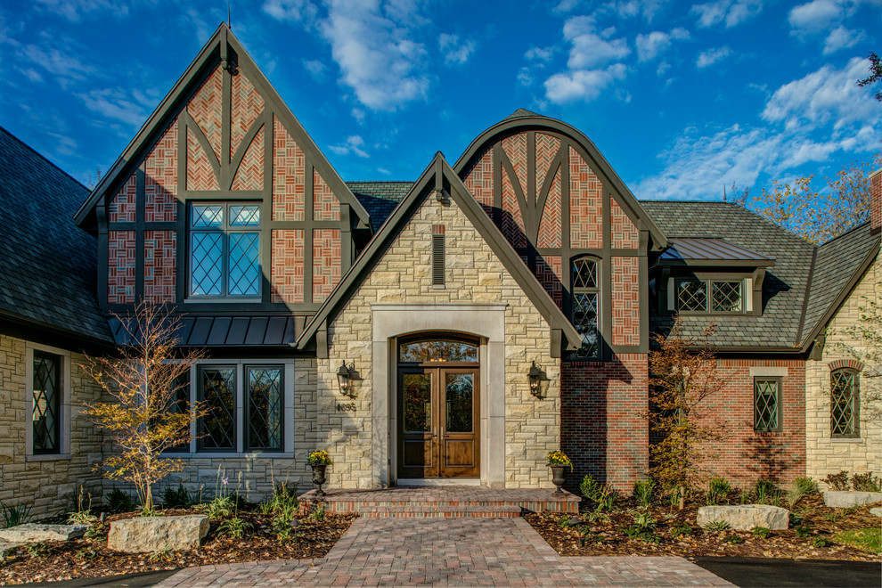 Reeds Lake English Tudor Revival Traditional Exterior Grand Rapids by Jennifer Butler Design