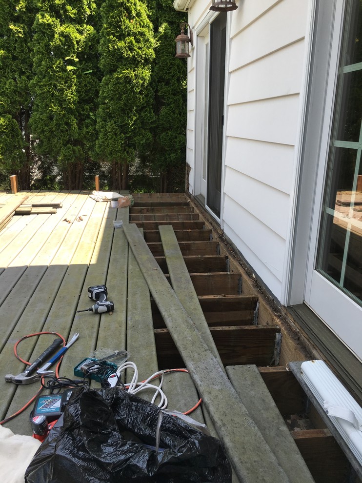 REPLACING JOIST SUPPORTS ON DECK.