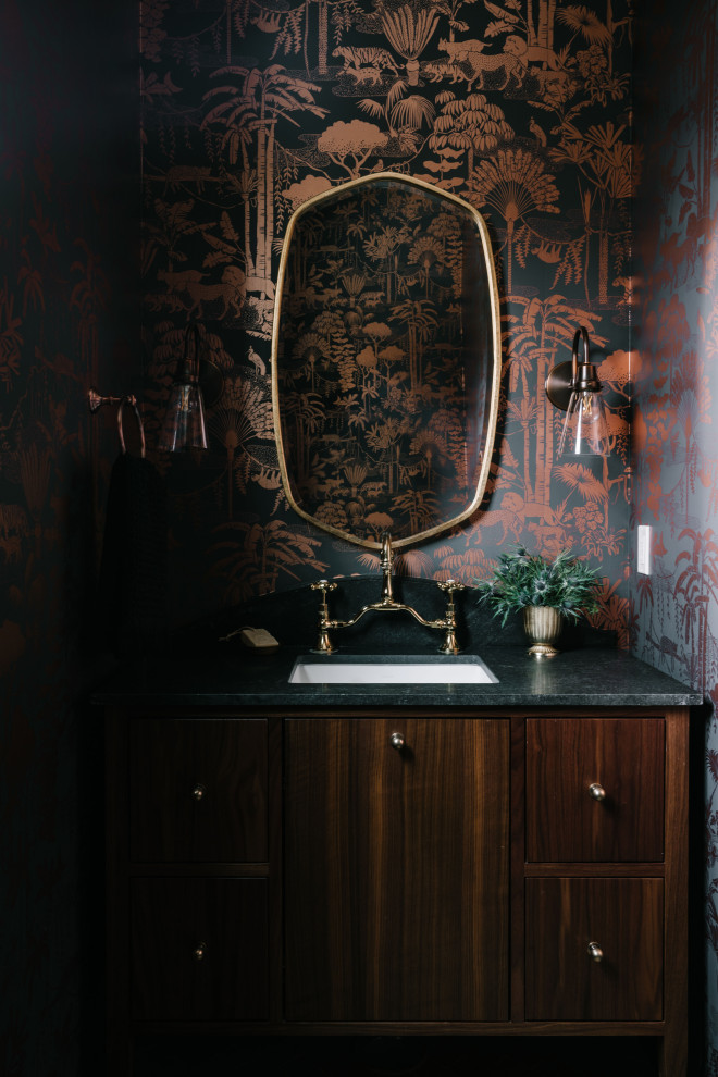 This is an example of a medium sized classic cloakroom in Salt Lake City with beaded cabinets, dark wood cabinets, a one-piece toilet, multi-coloured walls, brick flooring, a built-in sink, marble worktops, brown floors, blue worktops, a freestanding vanity unit and wallpapered walls.