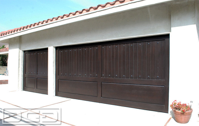 Mediterranean Style Garage Doors Handcrafted in Composite Wood Materials!
