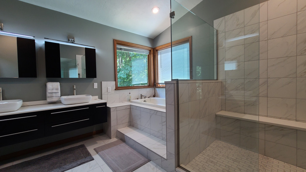Photo of a modern master bathroom in Other with quartzite benchtops, a double vanity and a floating vanity.