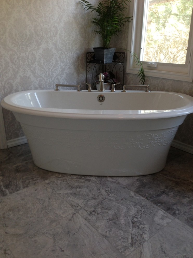 Bathroom - small transitional gray tile travertine floor bathroom idea in Seattle