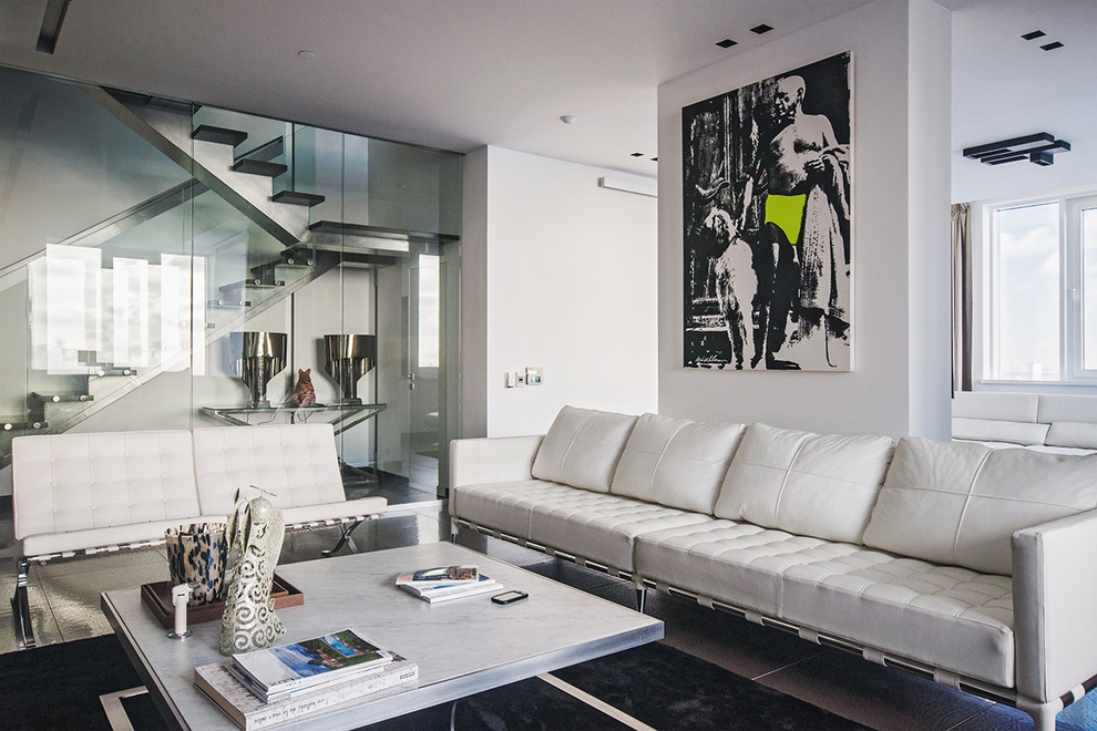 Inspiration for a contemporary formal enclosed living room in Moscow with white walls.
