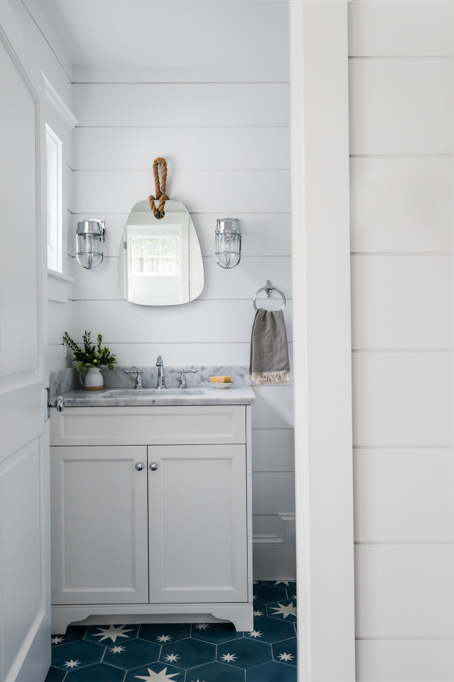 Beach style powder room photo in Boston