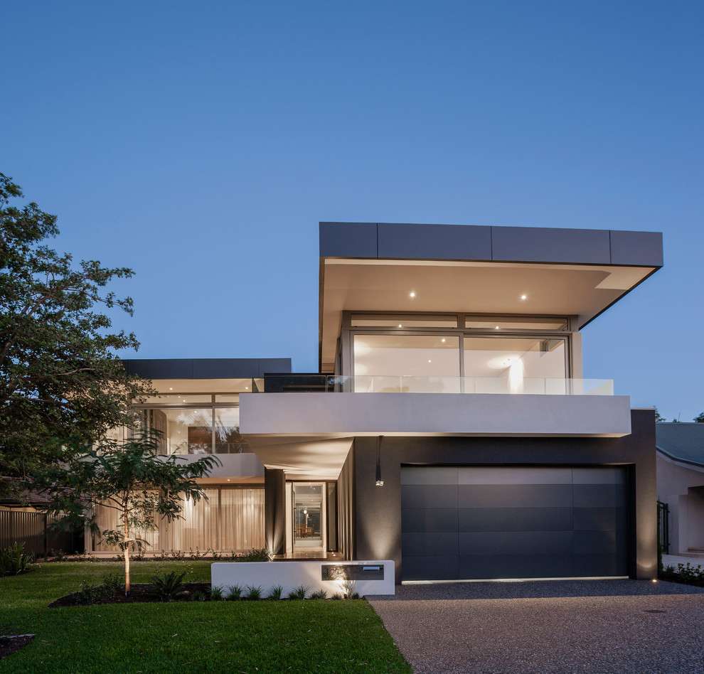 Large contemporary two-storey brick black exterior in Perth with a flat roof.